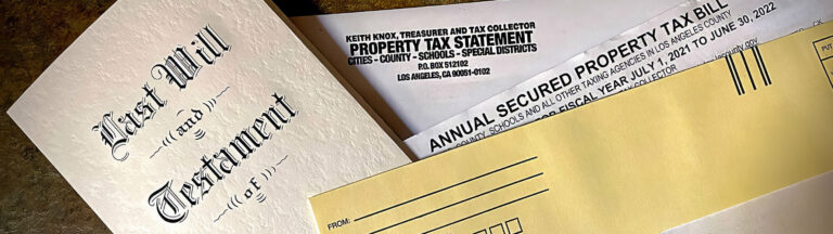 Close-up of a Last Will and Testament document alongside a yellow envelope and an annual secured property tax bill from Los Angeles County.