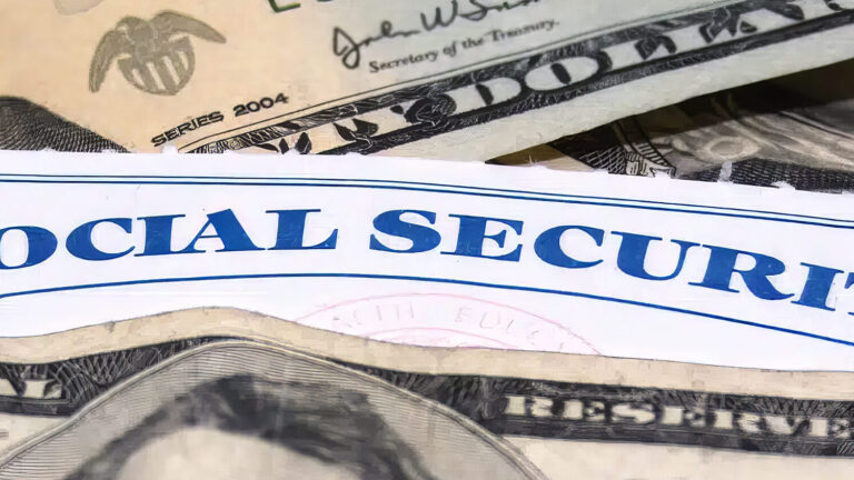 A Social Security card is partially visible among overlapping U.S. dollar bills, including $20 and $100 notes, suggesting a theme of finances or social benefits.