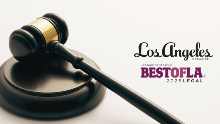 A wooden judge’s gavel rests on a sound block. Next to it are the logos for Los Angeles Magazine and BEST OF LA 2026 LEGAL.